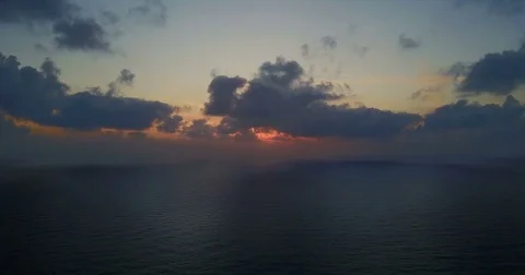 Brightly colored sunset over the calm Mediterranean Sea. Stock Footage 76850930