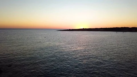Brightly colored sunset over the Cyprus see without clouds. Drone Point of View  Stock Footage 107064755