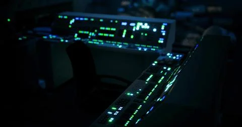 Brightly glowing control panel in a dark room during late night operations Stock Illustration