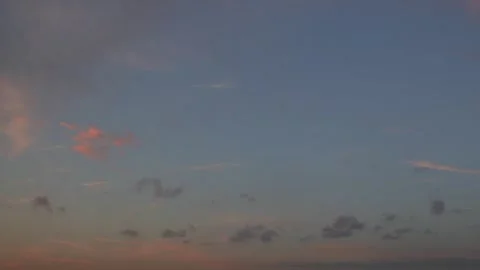 Brightly illuminated clouds at sunrise Stock Footage 340154446