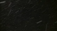 Brightly Lit Snow Drifts Against The Night Sky (High Definition) Stock Footage