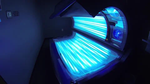Brightly Lit Tanning Bed Being Turned Off Stock Footage 34755789