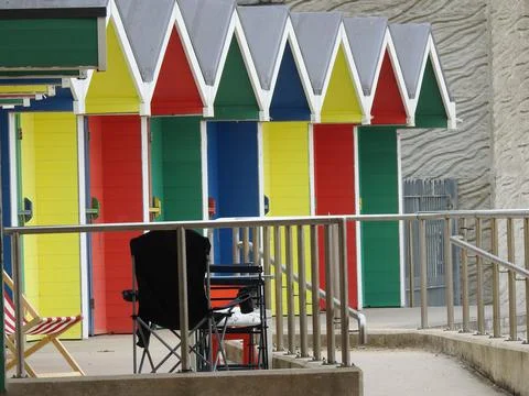 Brightly painted beach huts Stock Photos