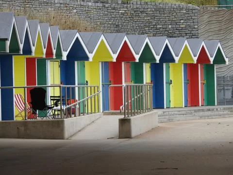 Brightly painted beach huts Stock Photos