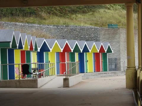 Brightly painted beach huts Stock Photos