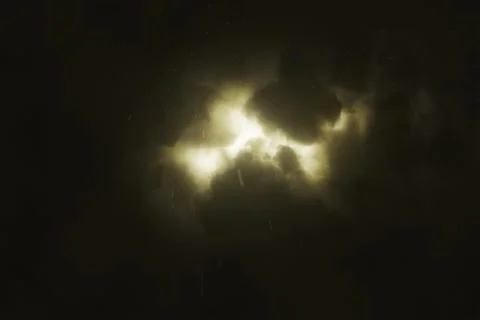 Brightly sparkling lightning breaks through the dense storm clouds in the night Stock Illustration
