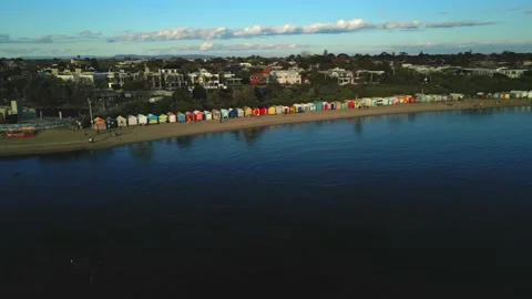 Brighton Beach Boxes sunset ( Melbourne)  - Drone 4k Stock Footage 210700534