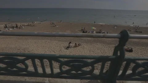 Brighton Beach slo-mo tracking shot Stock Footage 131760572