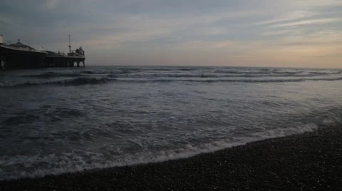 Brighton Beach at Sunset with Orange/Red Sky | HD 1080 Stock Footage 47716516
