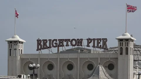 Brighton Pier Close up of flags and sign Video stock 64078104