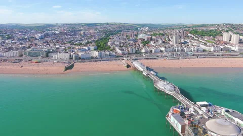 Brighton, UK: Aerial view of city in England, beach and waters of Atlantic Ocean Stock Footage 198146653