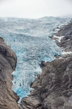 Briksdalsbreen with clouds on the ridge Stock Photos