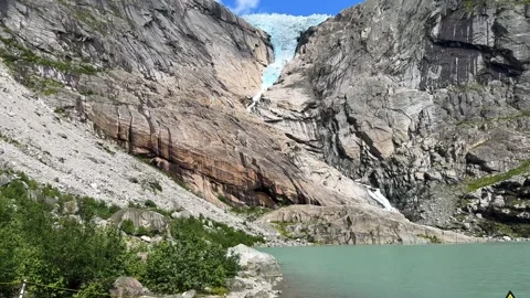 Briksdalsbreen glacier with a beautiful lake Video stock 337364520