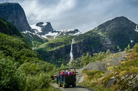 Briksdalsbreen glacier troll car excursion. Briksdal, Norway Stock Photos