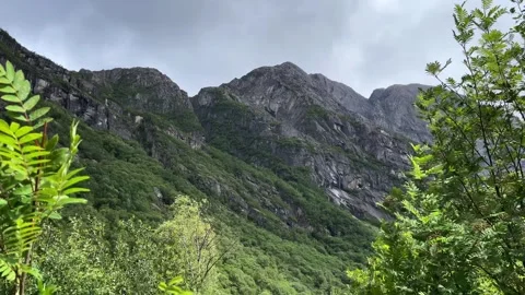 Briksdalsbreen Mountains forest in norway Stock Footage 337364997