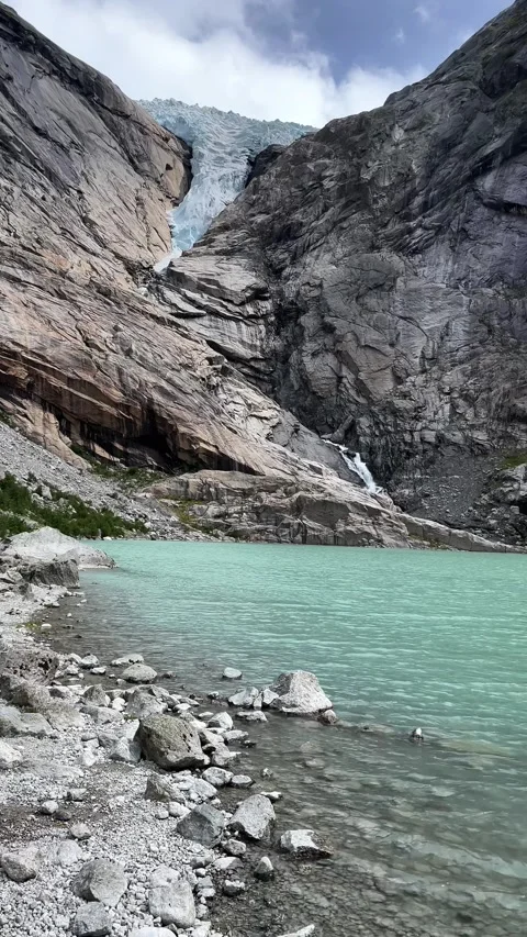 Briksdalsbreen in norway glacier among the mountai Stock Footage 337365011