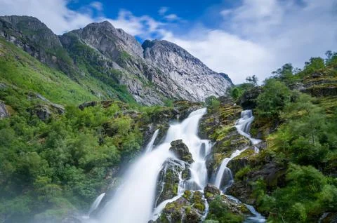 Briksdalsbreen waterfall long exposure and close view Stock Photos