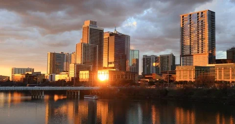 Brillian sunset Austin Texas river bridge city skyline 4K Stock Footage 102553101