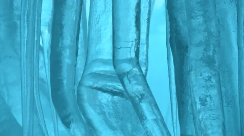 Brilliant blue icicles in deep crevasse, Antarctica Stock Footage 34294378