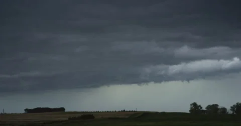 A brilliant bolt of lightning strikes South Dakota farmland Stock Footage 59333871