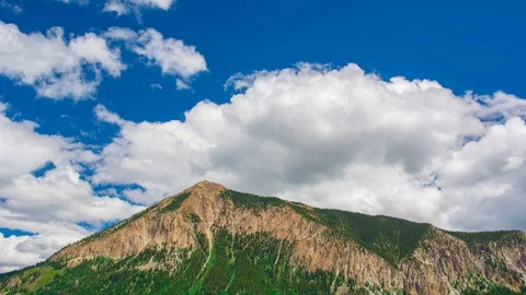 Brilliant Clear Sharp Mountain Peak in Summer Time Lapse, Timelapse, Time-Lap Stock Footage 128945510