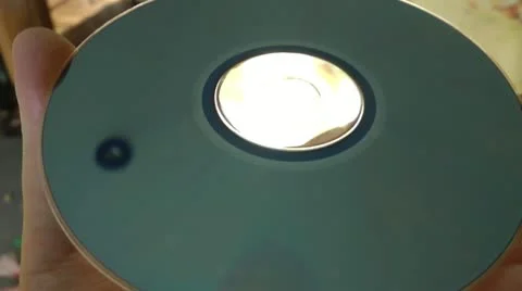 Brilliant DVD disk and reflection of a ceiling of a nursery in it Stockbeeldmateriaal 11819070