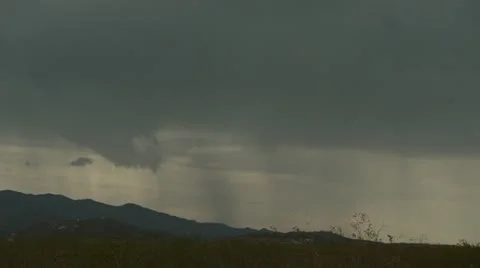 Brilliant flash of lightning under storm with rain shafts. Stock Footage 11406839