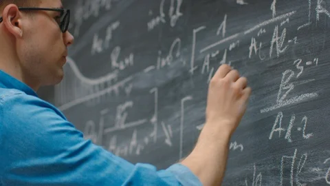 Brilliant Mathematician Writes Complex Math Equation/ Formula on the Blackboard. Stock Footage