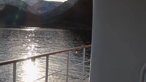 Brilliant Sun Path on Arctic Waters From a Serene Vessel Journey Video stock 338201479
