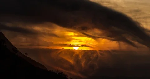 Brilliant Sunlight Piercing Through Golden Morning Mist (4K Time-lapse) Video stock 107911515