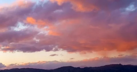 Brilliant Sunset Light on Cumulus Cloud Time-Lapse Stock Footage 167334639