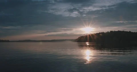 Brilliant Sunset over a Misty Lake in the North Vidéo 159727392