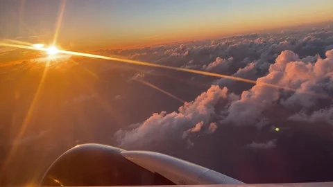 Brilliant Sunset view from Passenger on a Jet Stock Footage 167928247