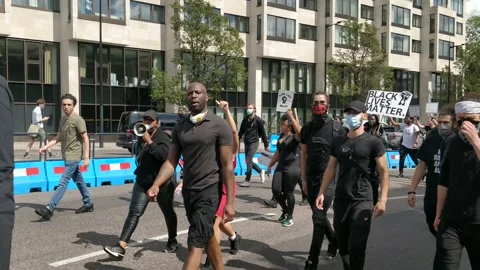 BRILLIANT TRACKING SHOT INSIDE BLACK LIVES MATTER MARCH IN LONDON UK, 4K Stock Footage 133141533