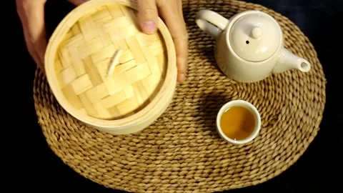 Bring the shrimp dumplings to the table and open the lid Stock Footage 236555033