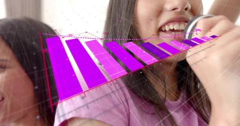 Bringing hand to mouth, right-side woman viewing 3D purple bar chart at home in 写真素材