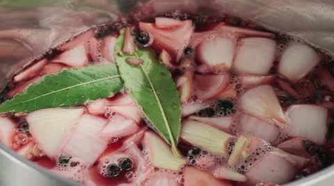 Bringing red wine marinade to the boil Stock Footage 24666573