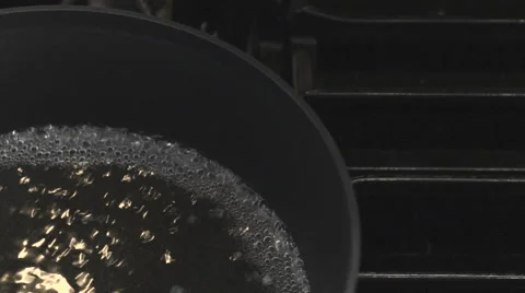 Bringing water to boil Stock Footage 47479046