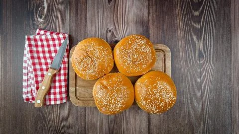 Brioche buns for hamburger, close-up, on a table Stock Photos