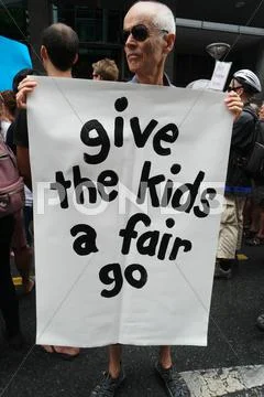 BRISBANE, AUSTRALIA - FEBRUARY 05 :Anti children in detention sign at protest Stock Photos
