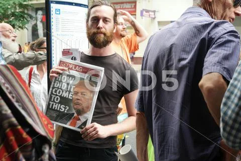 BRISBANE, AUSTRALIA - FEBRUARY 05 : Anti right wing newspaper at protest in s Stock Photos