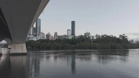 Brisbane CBD Aerial Beneath Captain Cook Bridge Pylon at Dawn Stock Footage 345085893
