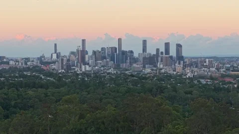 Brisbane CBD Skyline at Sunset Viewed Above Bushland Queensland Australia Stock Footage 338336630