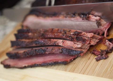 Brisket being sliced Stock Photos