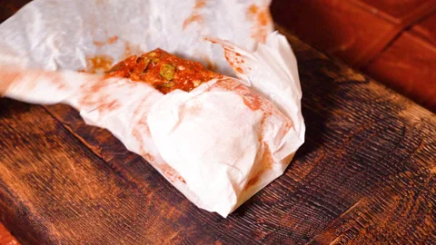 Brisket with spices wrapped in parchment Видео 249689257