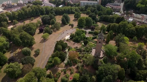 Bristol Cabot Tower surrounded by lush greenery of Brandon Hill park drone Video stock 322607600