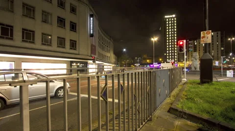 Bristol night traffic timelapse with traffic lights and fence Stock Footage 47016525
