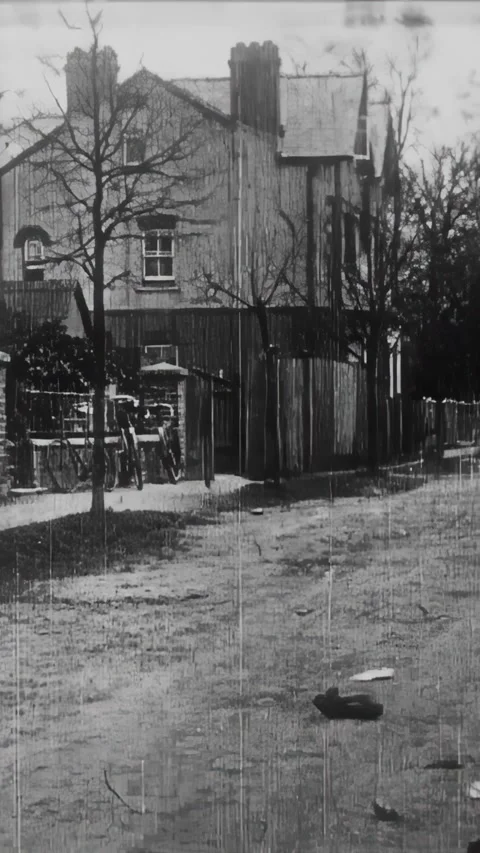 BRITAIN - 1902 - In this silent comedy, a motorist smashes a cop to pieces by Stock Footage 340208611