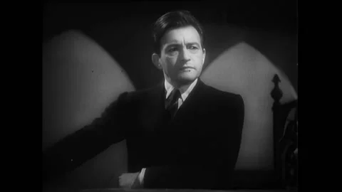 BRITAIN - 1935 - In this thriller, a prosecutor calls the wife of a clairvoyant Stock Footage 308178923