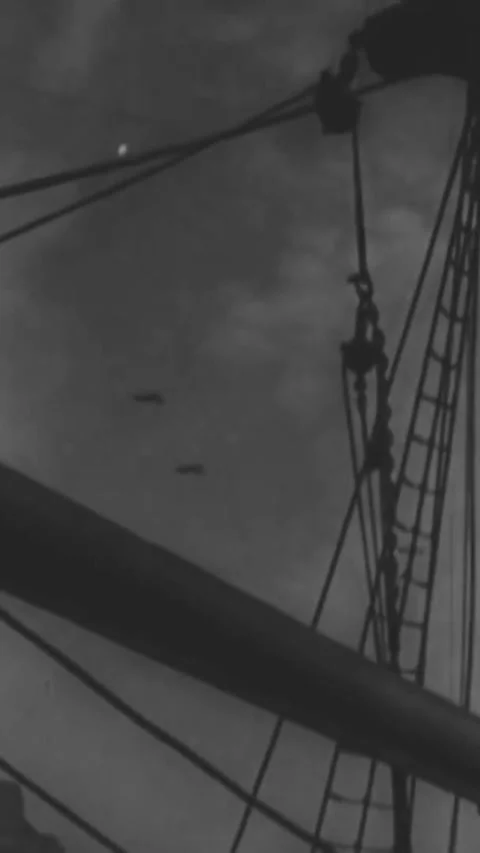 BRITAIN - 1940 - In this Frank Capra documentary, Luftwaffe planes attack port Stock Footage 338414751